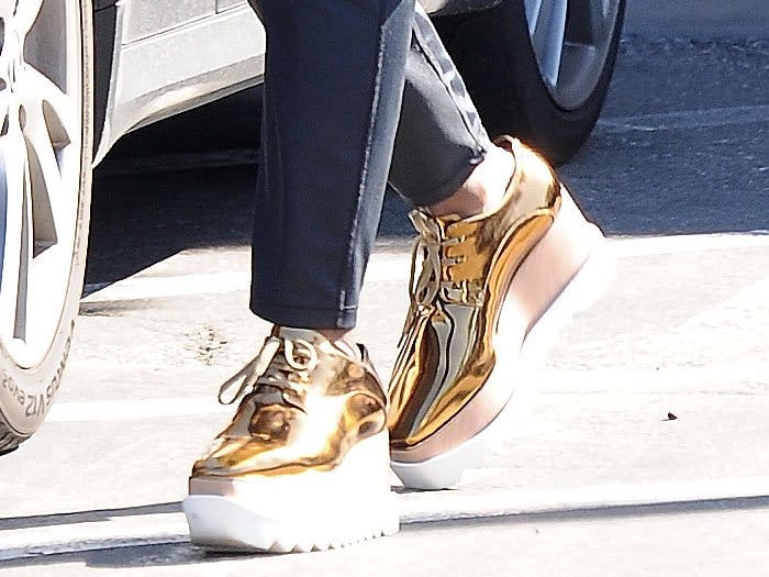 Closeup of Viola Davis' Stella McCartney gold "Elyse" creepers that she wore to the 2017 Vanity Fair Oscar Party