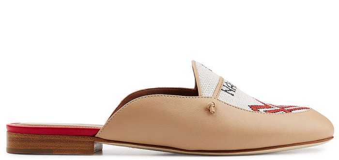The side view of the “Neva” leather slippers by Malone Souliers x Natalia Vodianova showcases the delicate linen stitching, embodying a tribute to craftsmanship and Natalia's commitment to her foundation