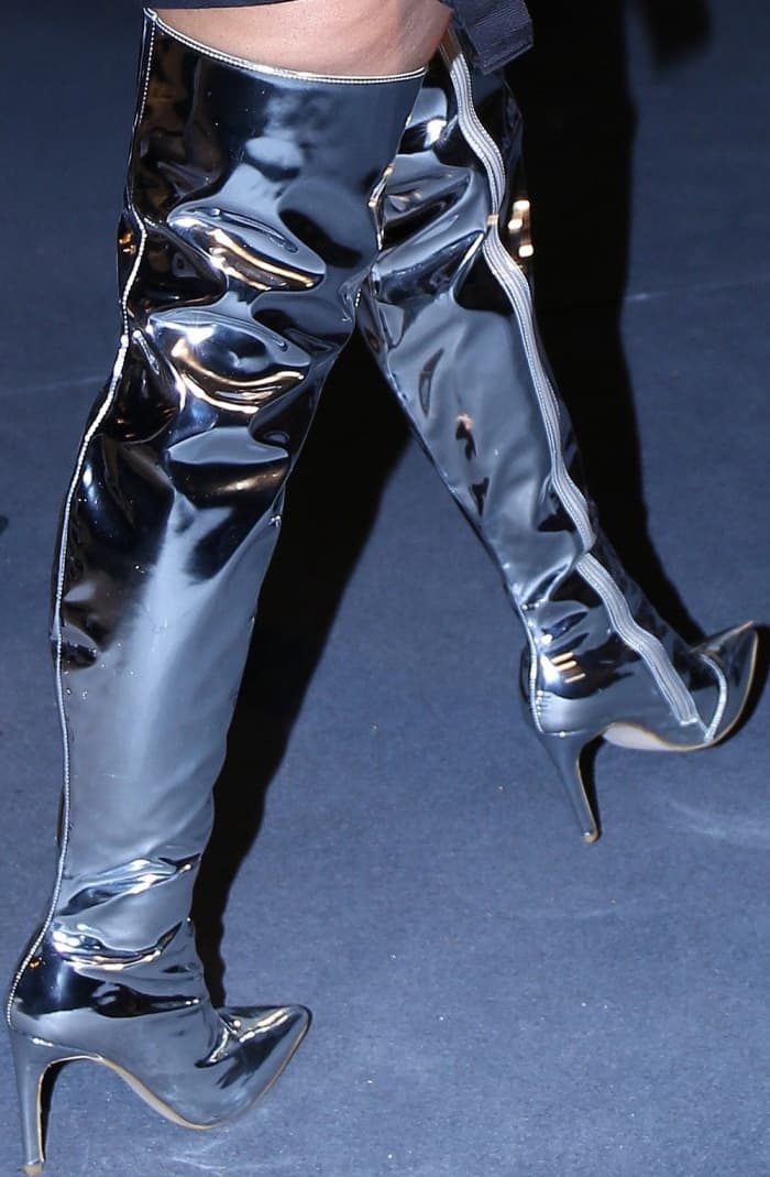 Nicki Minaj stuns in futuristic Balenciaga mirrored thigh-high boots