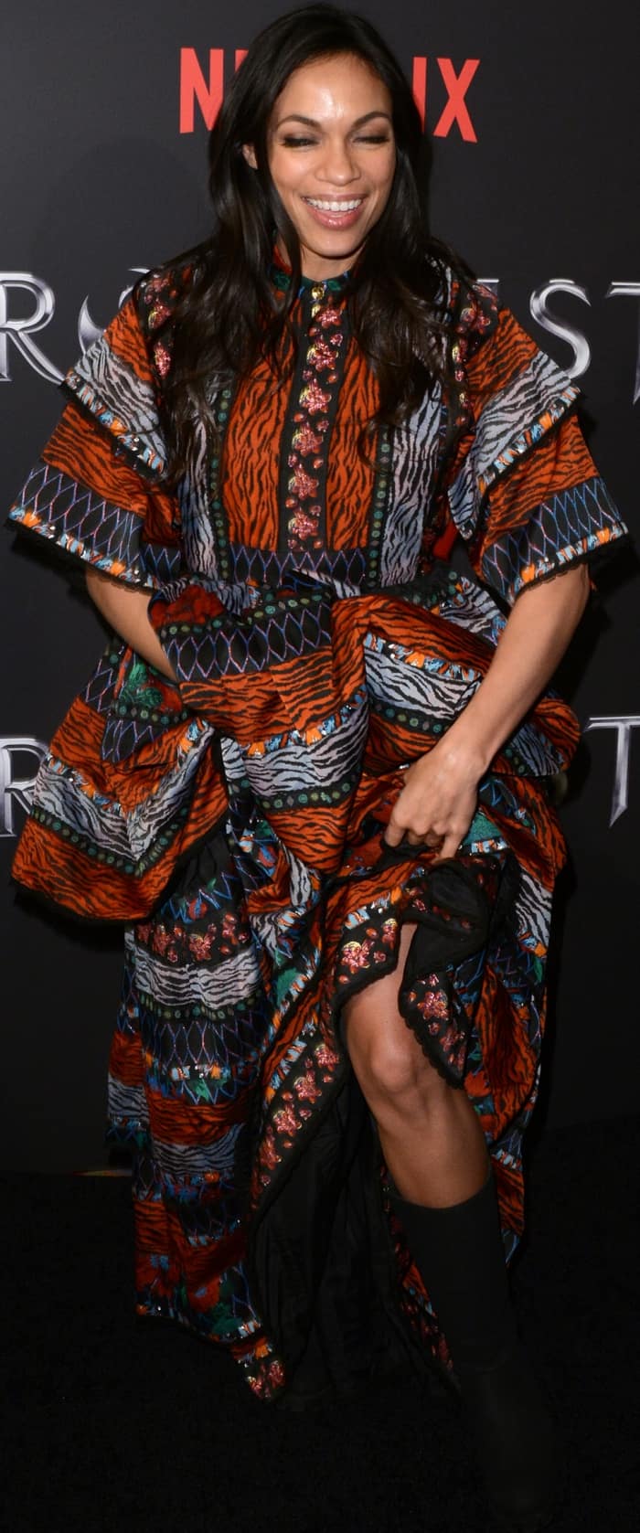 Rosario Dawson wearing a Kenzo x HM patterned maxi dress at the New York screening of Marvel's "Iron Fist"