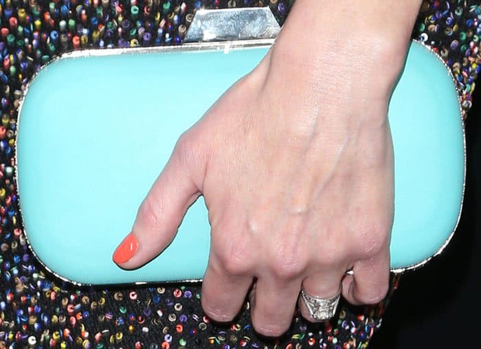 Alexis Bledel added a playful pop of color to her shimmering premiere look with a Tiffany blue Lili Radu clutch and a vibrant orange manicure that echoed the bold tones of her yellow sandals