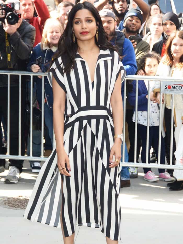 The actress shows off the striking geometric lines of her Akris Spring 2017 silk crepe dress while promoting her Showtime series Guerrilla