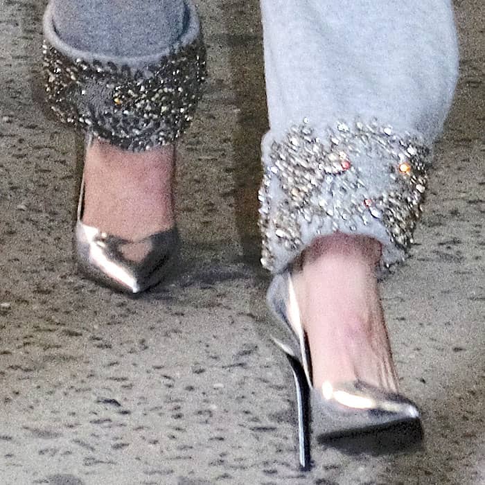 Closeups of the Stella Luna "Indispensable Classic" classic pumps in silver specchio on Gigi Hadid.