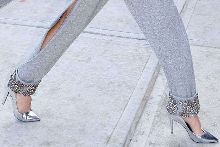 Closeups of the Stella Luna "Indispensable Classic" classic pumps in silver specchio on Gigi Hadid.