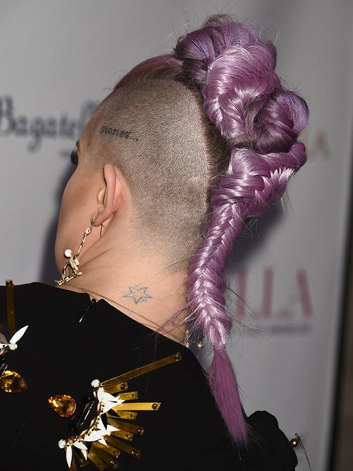 Kelly Osbourne rocking a purple braided mohawk with shaved sides at the Bella Magazine cover party in NYC