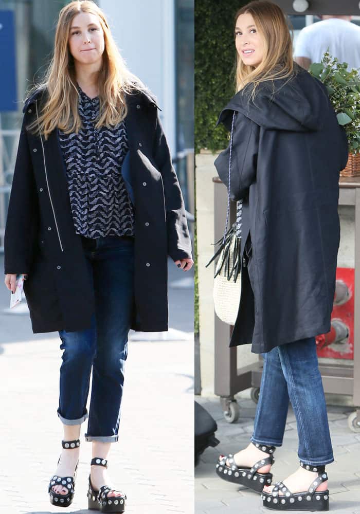Whitney Port pairs cuffed jeans and a printed top with Alexander Wang “Sandrah” flatform sandals, featuring oversized silver studs and chunky platform soles, for an appearance on “Extra” in Los Angeles