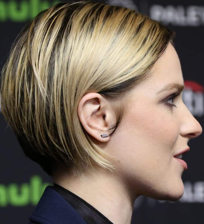 Evan Rachel Wood showed off her sleek side-parted bob, styled with a smooth, glossy finish that highlighted her sharp tailoring and minimalist jewelry
