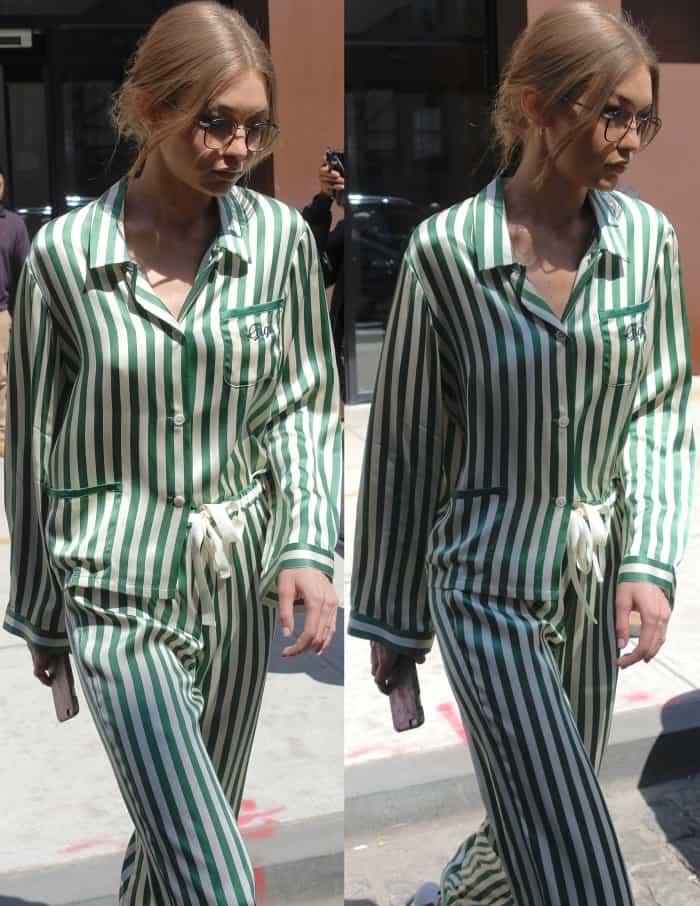 Gigi’s custom-embroidered Morgan Lane top stands out as she navigates the sidewalk in effortless off-duty style