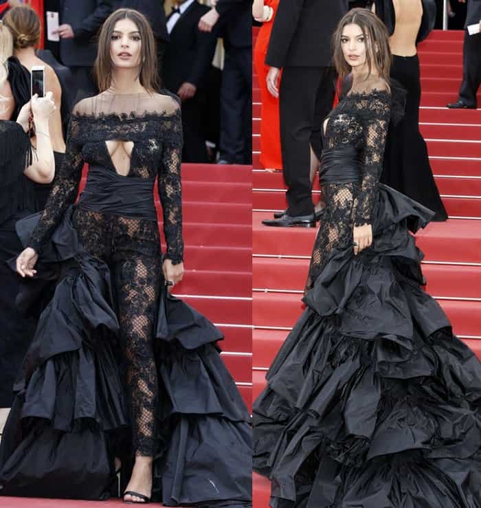 Emily Ratajkowski captivates in a daring sheer lace bodysuit gown with off-the-shoulder detailing and voluminous ruffled tiers for a bold yet elegant statement