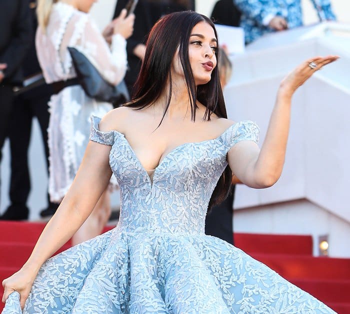 The former beauty queen Aishwarya Rai Bachchan blows a kiss to her audience at the 70th annual Cannes Film Festival "Okja" premiere held at Palais des Festivals in Cannes