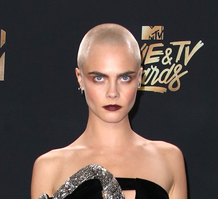 Cara Delevingne in head-to-toe Saint Laurent for the MTV Movie TV Awards on May 7, 2017 at the Shrine Auditorium in Los Angeles