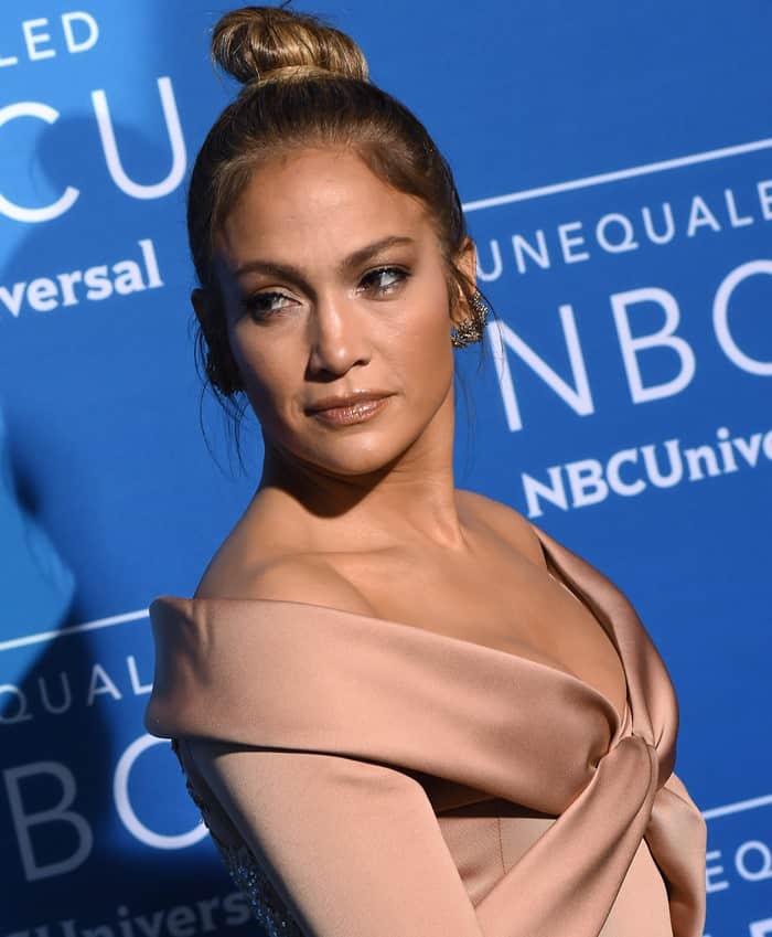Jennifer Lopez's satin gown from the Elie Saab Spring 2017 Couture collection featuring a knotted detail