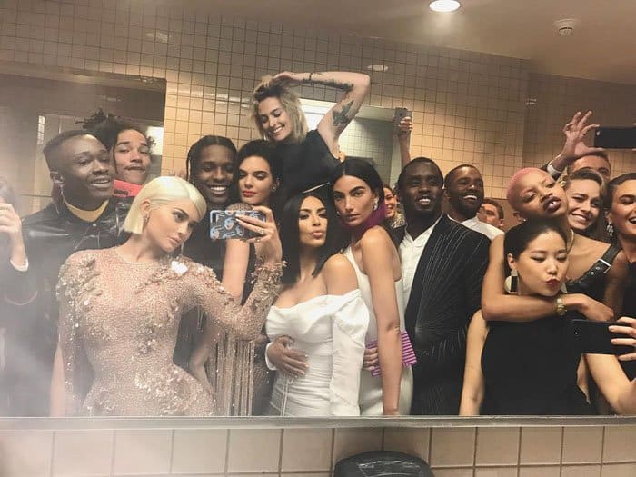 Kylie Jenner captures an iconic, star-studded bathroom selfie at the 2017 Met Gala, featuring Kim Kardashian, A$AP Rocky, Kendall Jenner, Lily Aldridge, and more fashion elites