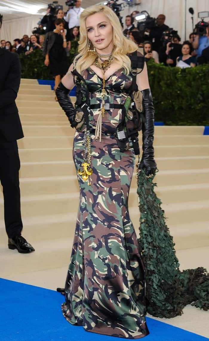 Madonna wearing a full-length camouflage Moschino gown at the 2017 Met Gala in New York City on May 1, 2017