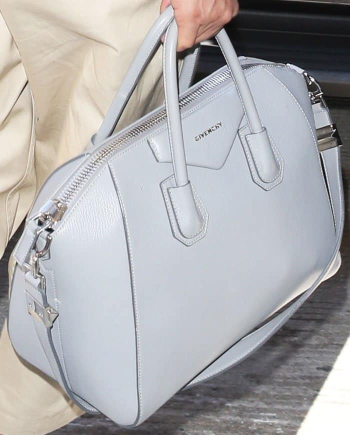 Priyanka completes the look with a structured dove-gray Givenchy Antigona tote, adding a luxe, travel-ready touch