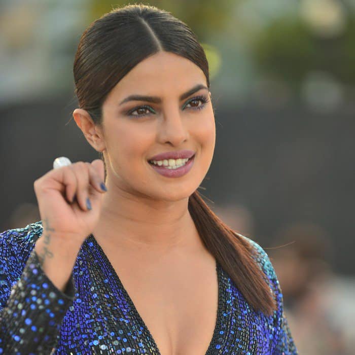 Priyanka Chopra in a bathrobe dress from Vintage Halston