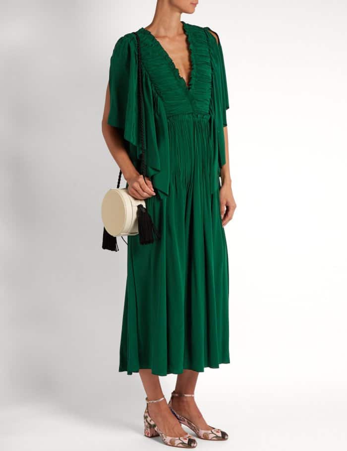 Model wearing Aquazzura for de Gournay embroidered pumps