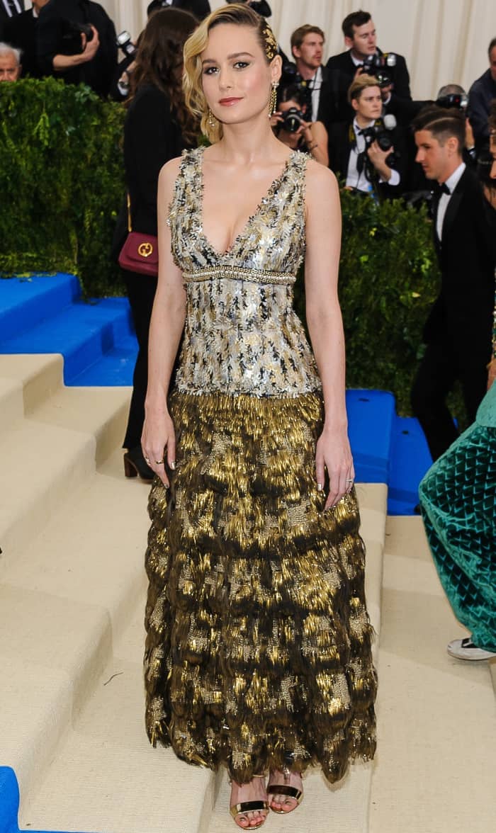 Brie Larson wearing a Chanel pre-fall 2017 gown and Christian Louboutin "Choca Criss" sandals at the 2017 Met Gala
