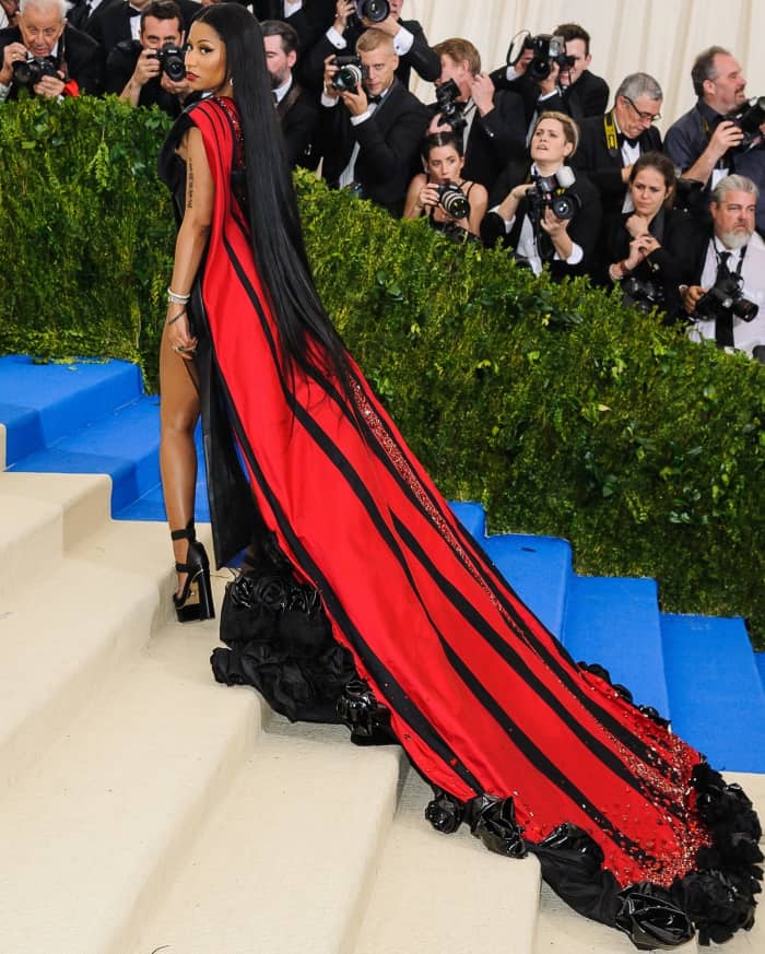Nicki Minaj wearing a custom HM gown and Versace "Medusa" platform sandals at the 2017 Met Gala