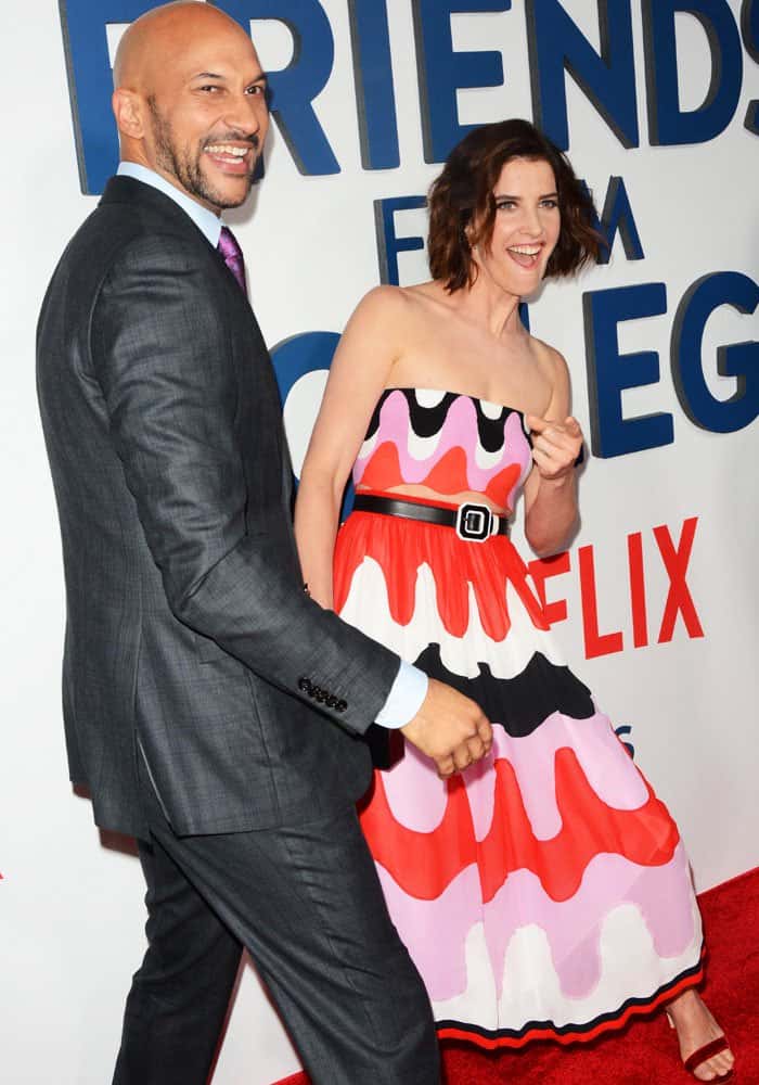 Cobie Smulders shares a lighthearted red-carpet moment with Friends from College co-star Keegan-Michael Key, both radiating easy comedic chemistry