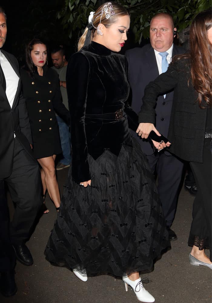 The paparazzi goes crazy as Rita Ora makes her way into the venue