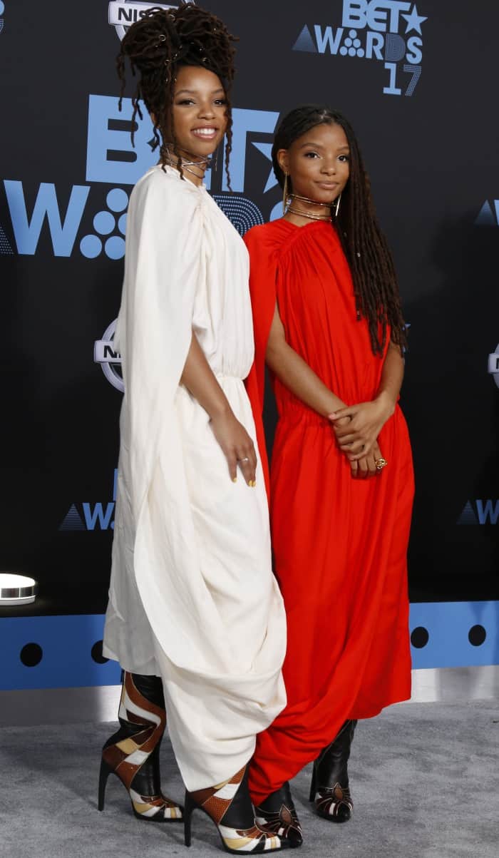 Chloe and Halle Bailey wearing Ms MIN dresses and Rodarte boots at the 2017 BET Awards
