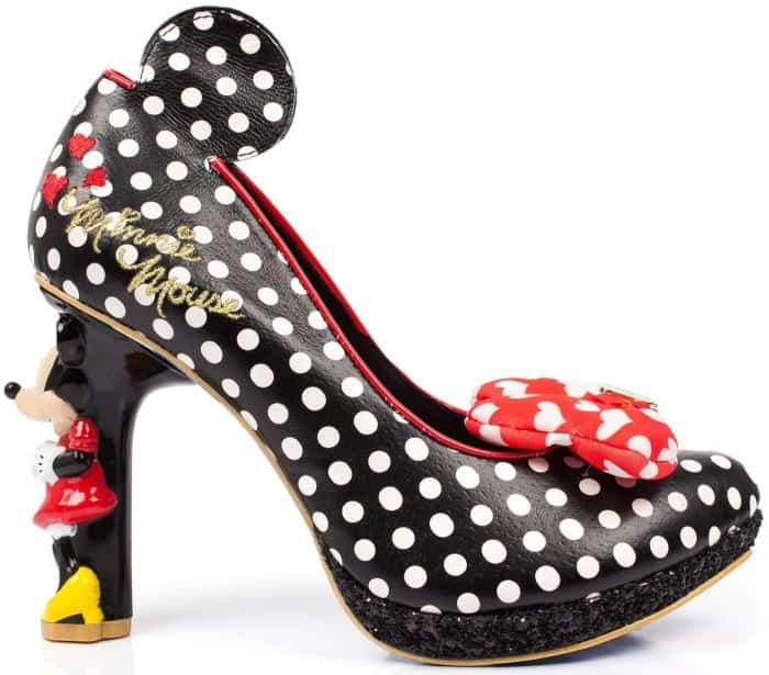 The “Oh My” pumps feature black glitter-encrusted platforms and Minnie Mouse sculptural high heels