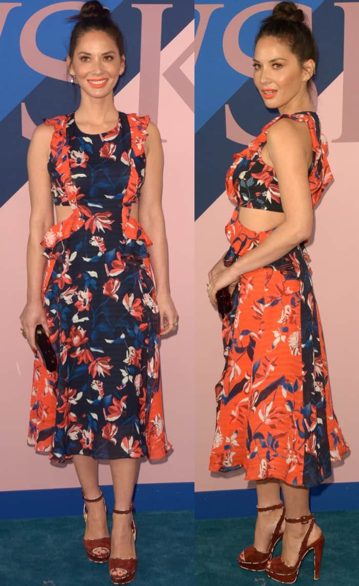 Olivia Munn exudes tropical charm in a floral Tanya Taylor dress with playful cutouts, paired with bold Christian Louboutin 'Louloudance' platform sandals