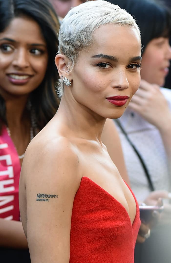 Zoë Kravitz shows off her Tiffany Co. diamond cluster earrings and "MISSISSIPPI *@!!?*@!” tattoo that's a tribute to Nina Simone‘s song “Mississippi Goddamn”
