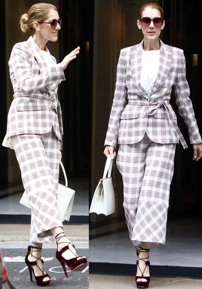 Celine Dion flawlessly paired a plaid belted suit with burgundy velvet platform heels and a structured white handbag