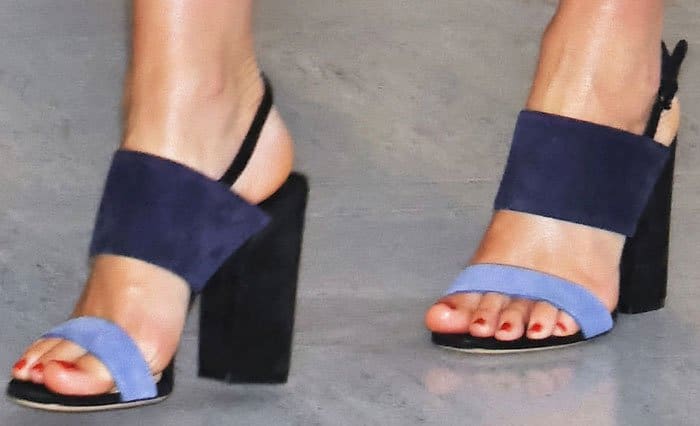 The color-block Salvatore Ferragamo 'Elba' sandals complete Miranda Kerr's look, adding a sophisticated touch to her floral pants
