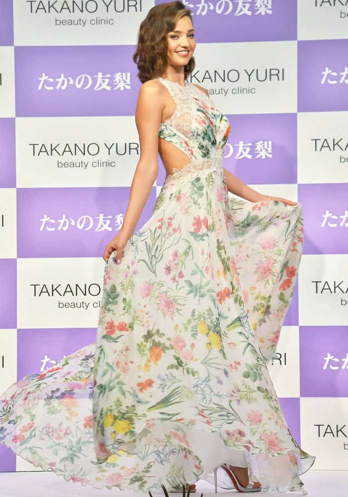 Miranda twirls around in a creation by American-based Japanese designer Tadashi Shoji