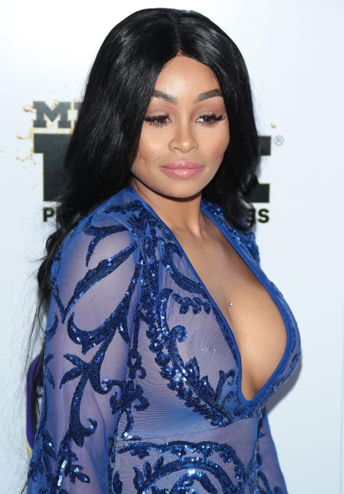 Blac Chyna flaunted her curves in a sparkly blue plunging dress