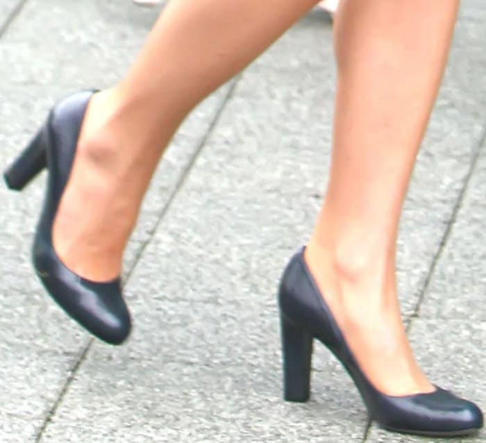 A clear view of the L.K. Bennett 'Art' pumps highlights their versatile silhouette and the practical block heel that makes them a reliable staple for the Duchess