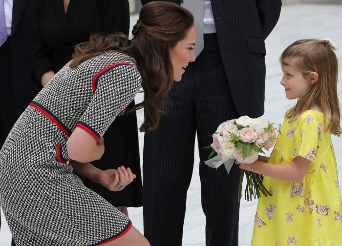 In a look anchored by her trusted L.K. Bennett pumps, Kate Middleton greeted museum director Tristram Hunt’s daughter, Lydia, at the Victoria and Albert Museum