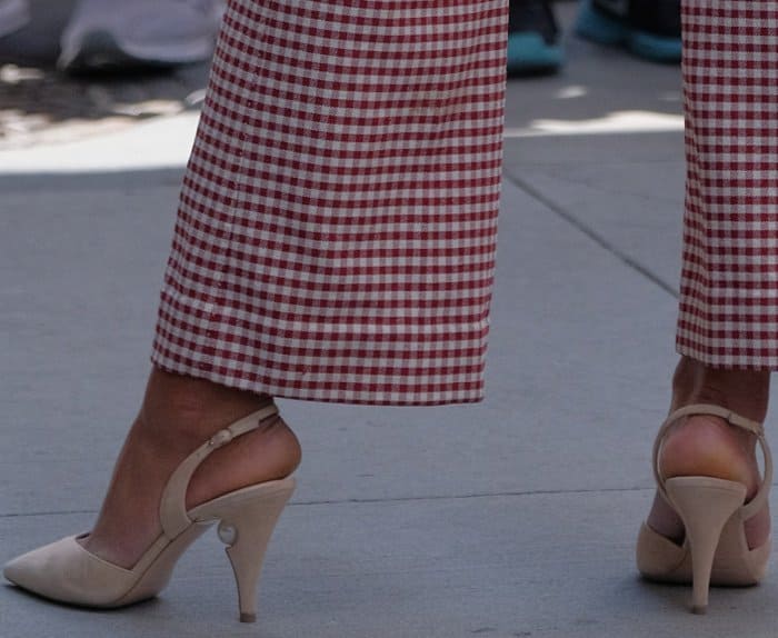 Laura Harrier wearing a Brock Collection Fall 2017 ensemble and Nicholas Kirkwood "Penelope Pearl" slingback pumps at AOL Build