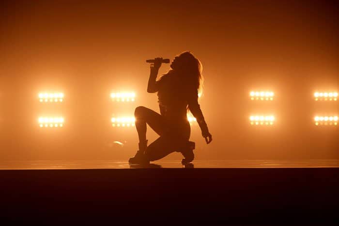 Ellie Goulding released behind-the-scenes photos of her video shoot which showcased her latest designs as well