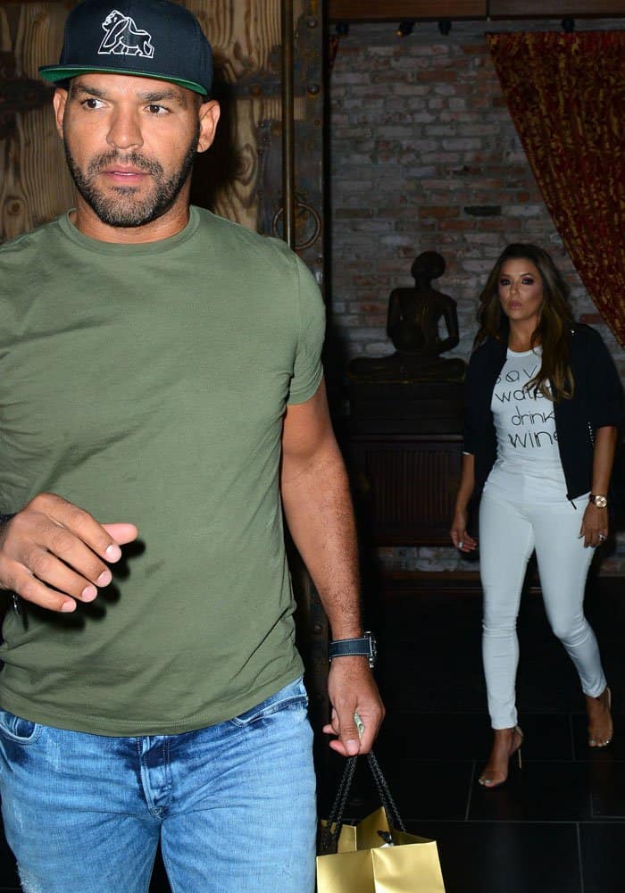 Husband José Bastón goes ahead of the actress to open the car door for her