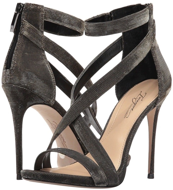Parading crisscross straps grant timeless glamour to a sleek sandal