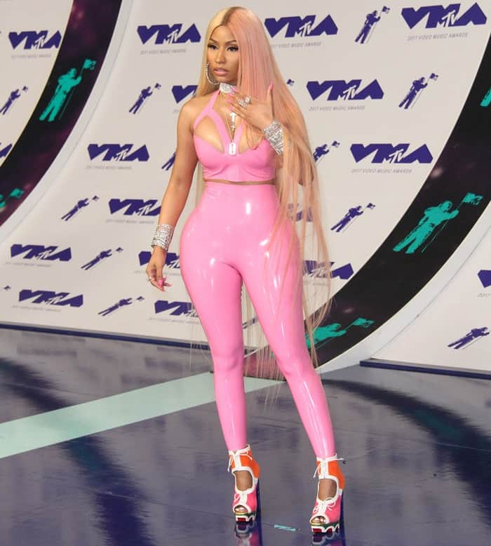 Nicki Minaj styled her bubblegum pink latex bodysuit with a colorful pair of peep-toe heels