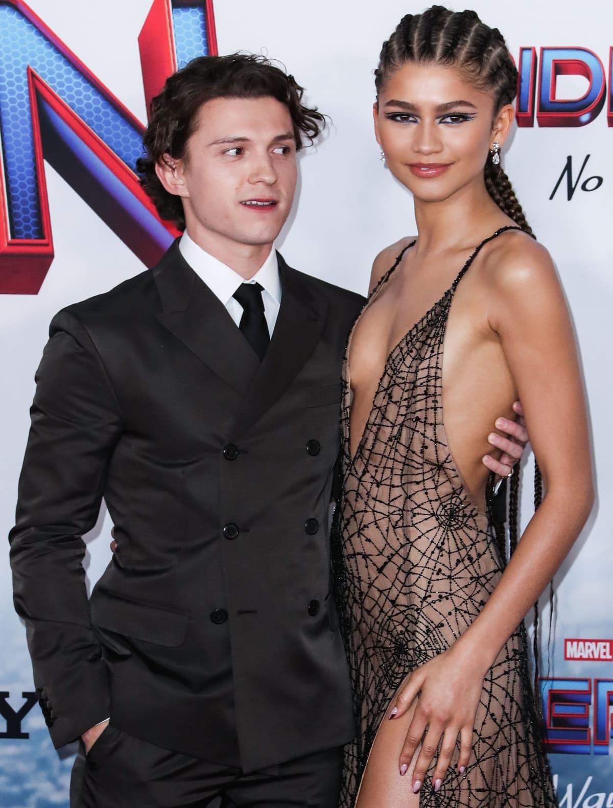 Zendaya stunned in her custom Valentino spiderweb gown alongside Tom Holland at the Spider-Man: No Way Home premiere
