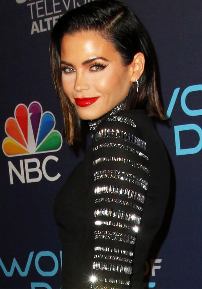 Jenna Dewan dazzles with bold red lips and sleek hair, highlighting the crystal-embellished detailing on her Azzaro mini dress