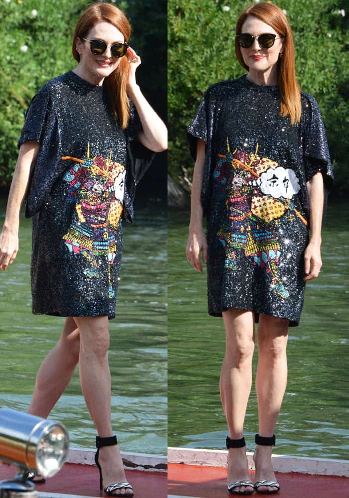 Julianne arrives at the port in a head-to-toe Louis Vuitton look