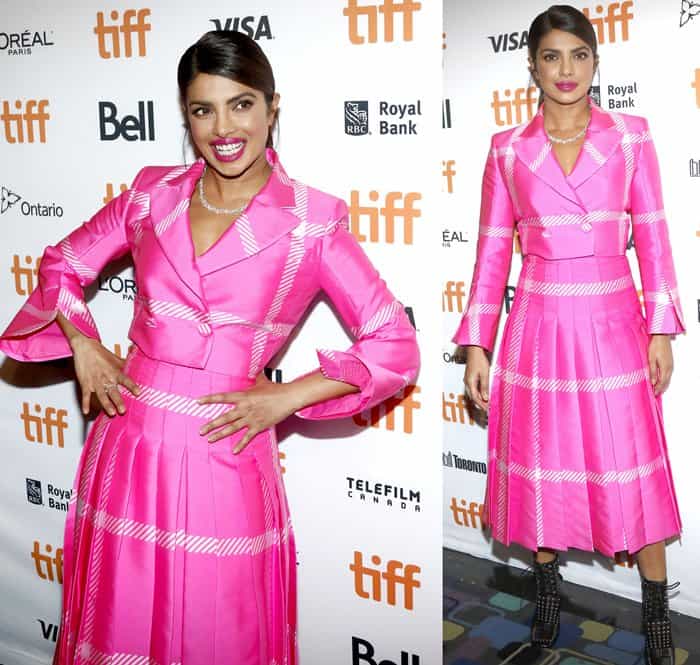 Priyanka Chopra contrasted Fendi's bright pink cropped blazer and pleated midi skirt with black square-toe studded ankle boots, creating one of her most unexpected red carpet styling combinations