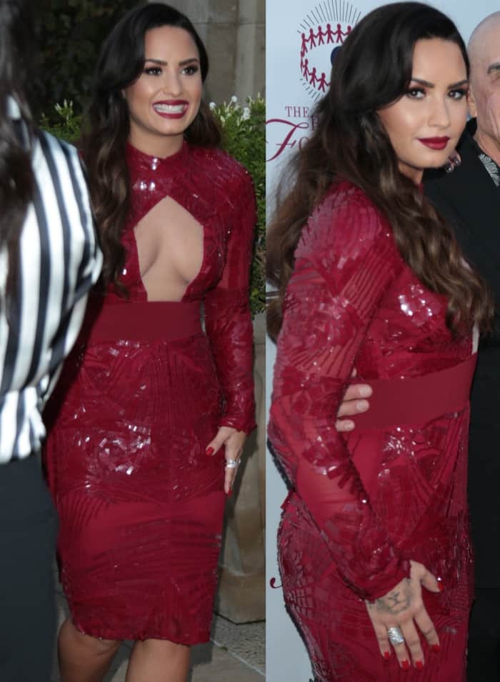 Demi Lovato makes a stunning red-carpet entrance in a scarlet Bibhu Mohapatra gown