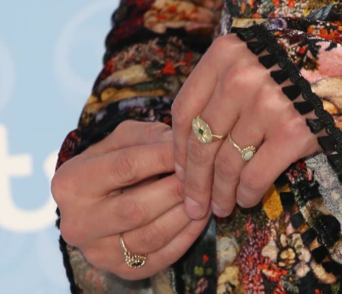 Jenna Coleman accessorized the red carpet look with a curated mix of delicate gold rings that complemented the dress’s ornate embroidered detailing
