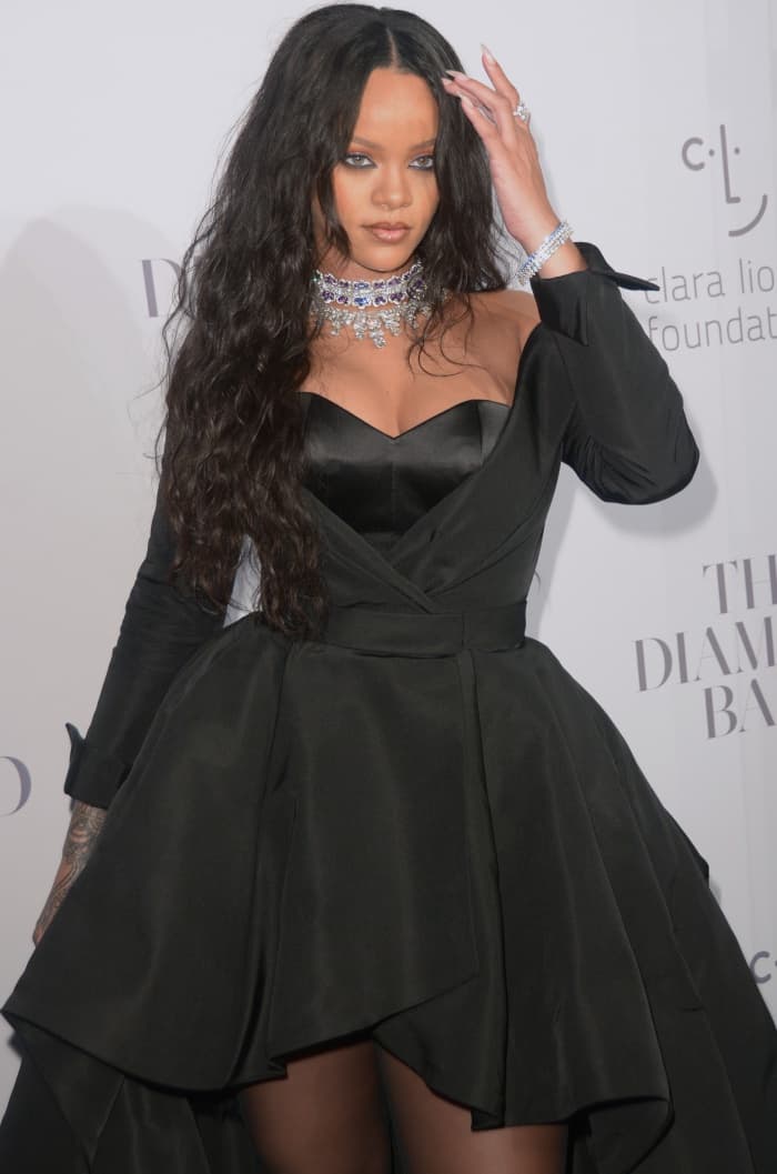 Rihanna wearing a custom black Ralph Russo Couture gown and Giuseppe Zanotti "Harmony" sandals at the 3rd Annual Diamond Ball