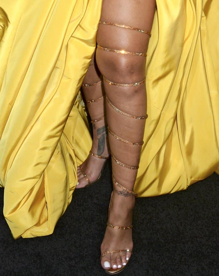 Rihanna showcased her Manolo Blahnik lace-up heels, with straps extending up to her thighs