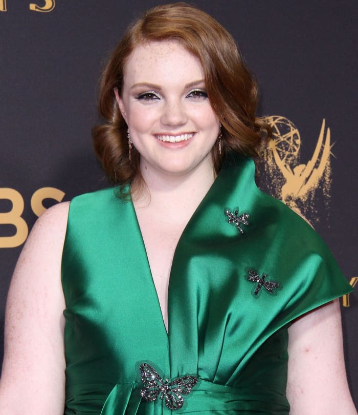 Shannon Purser wearing a custom emerald green Sachin Babi gown at the 69th Emmy Awards