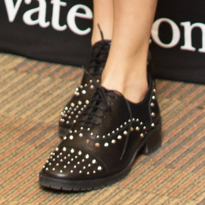 Cara Delevingne takes the studs all the way to her feet with a pair of Derby shoes by The Kooples